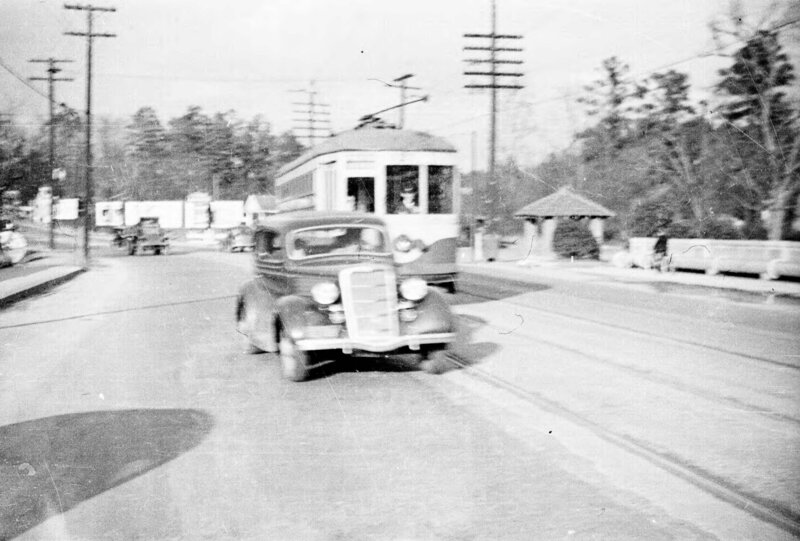 Cars and a streetcar, Atlanta, Georgia, circa late 1930s or early 1940s