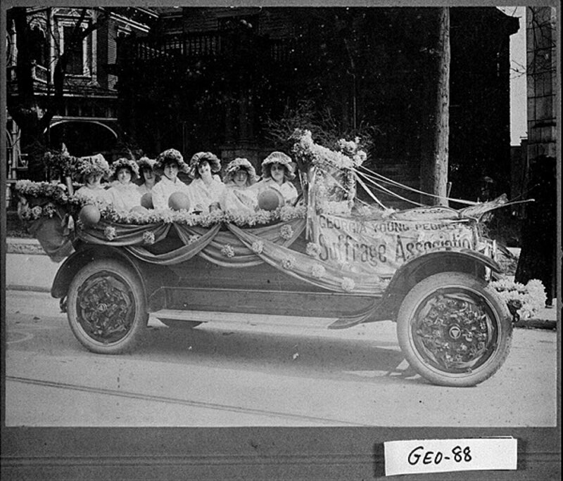[Photograph of representatives of Georgia Young People Suffrage Association in parade with Margaret Koch driving vehicle, Georgia, not after 1920 Aug. 26]